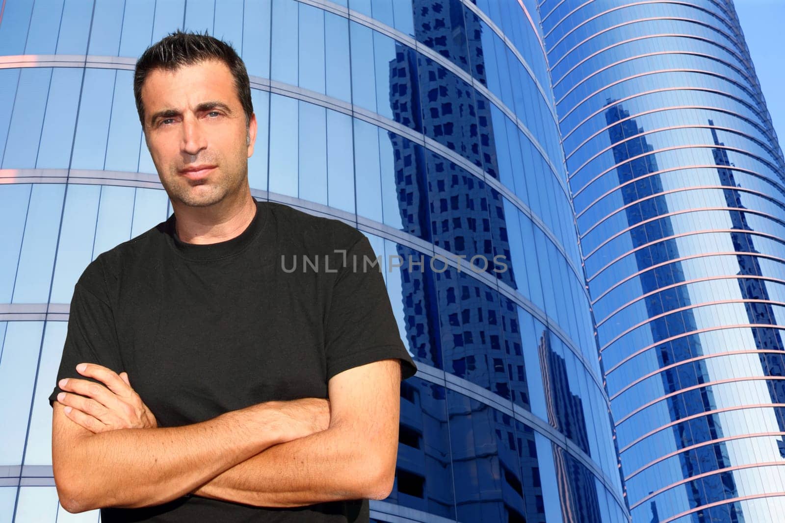 Mid age man portrait in urban modern office buildings