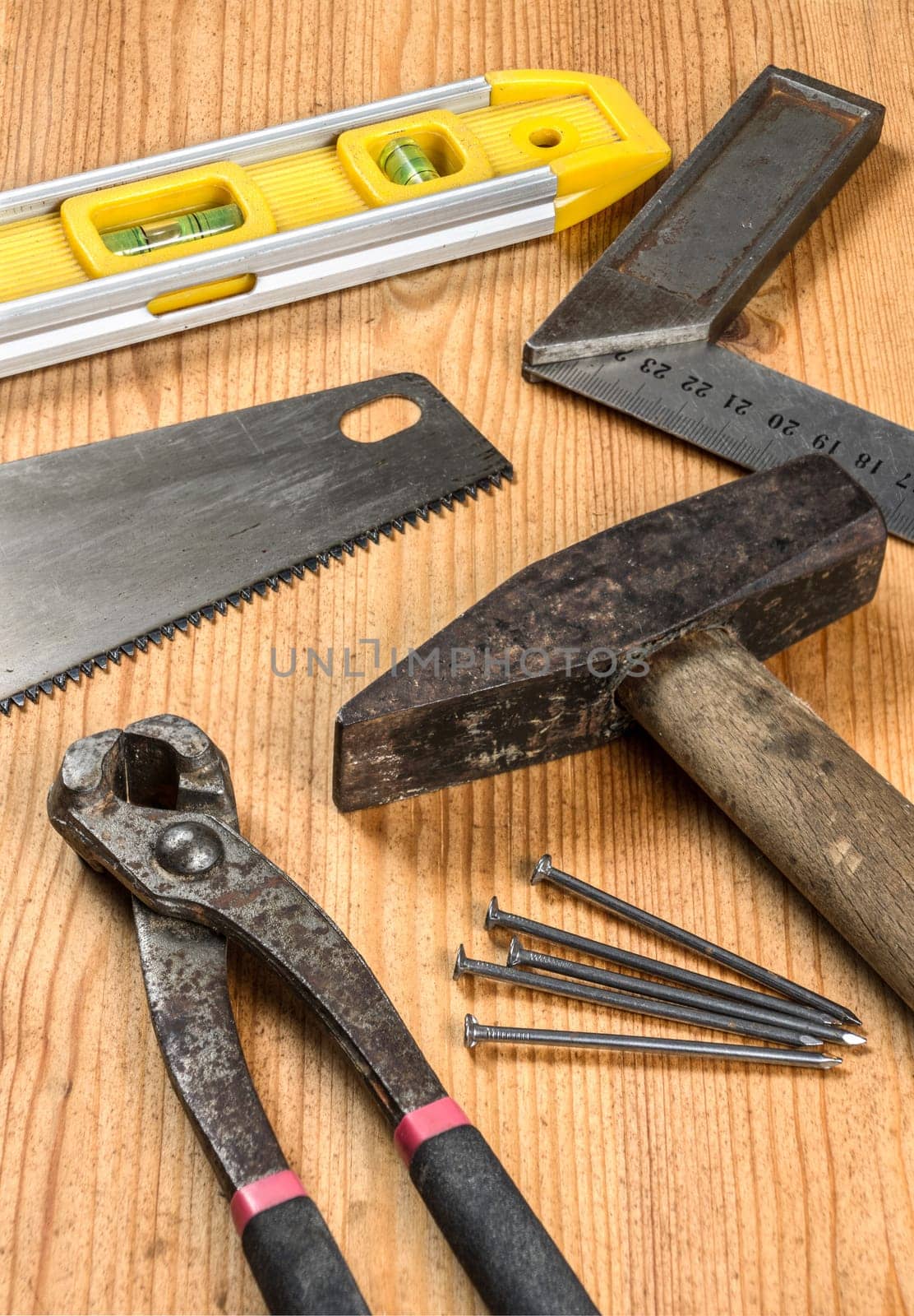 Various tools on wooden surface