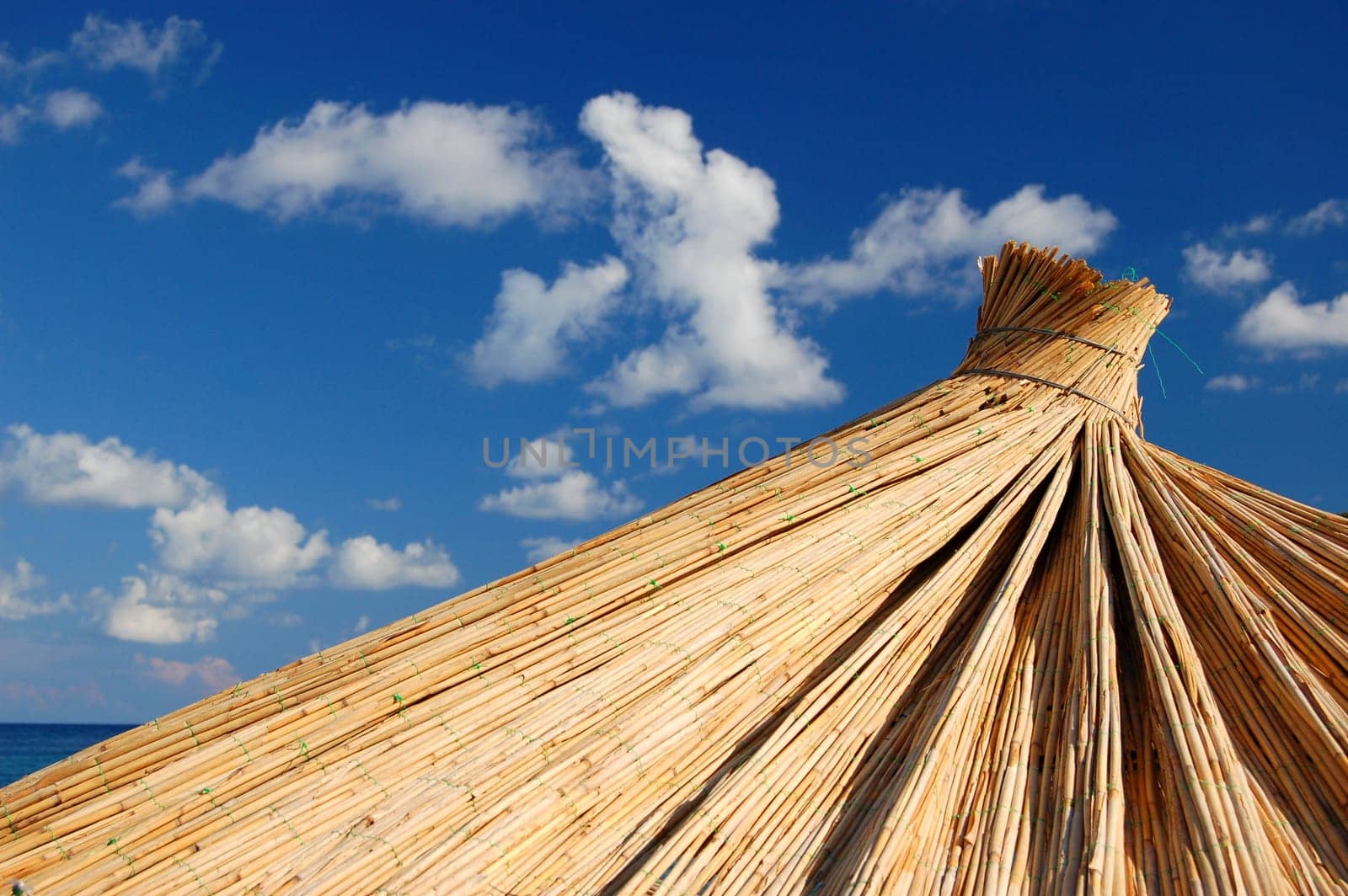 Straw umbrellas on Montenegrin beach