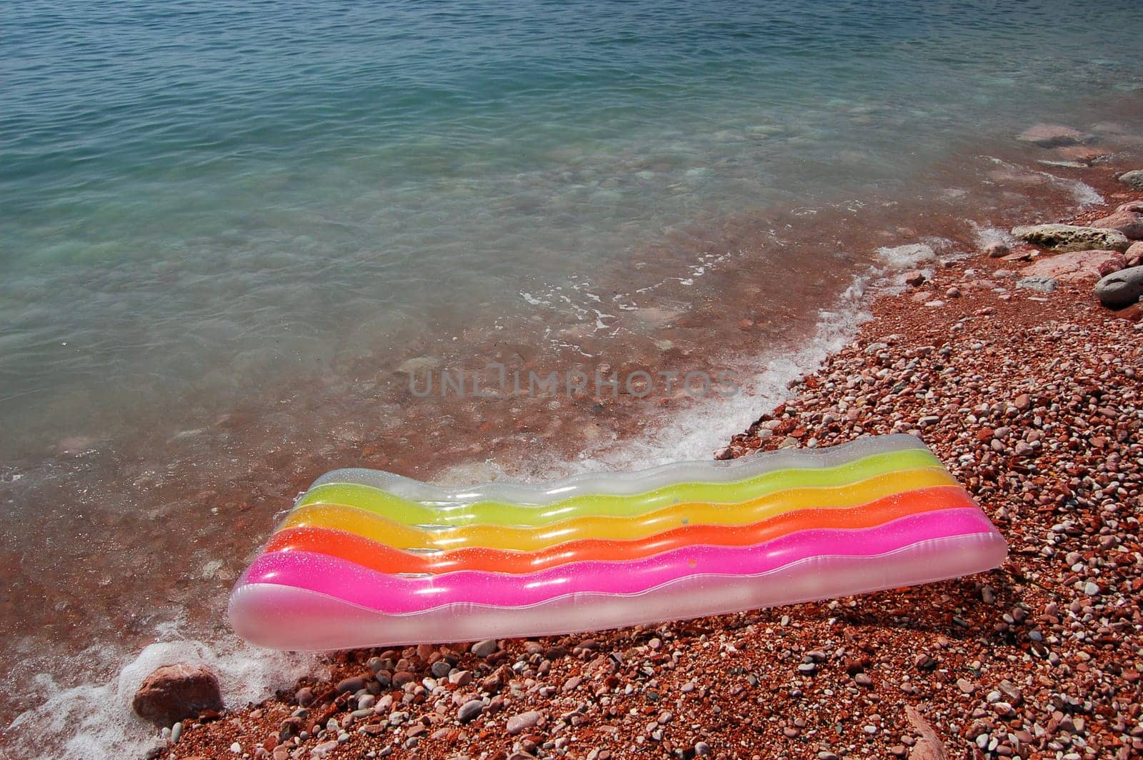 Colored mattress on Adriatic water