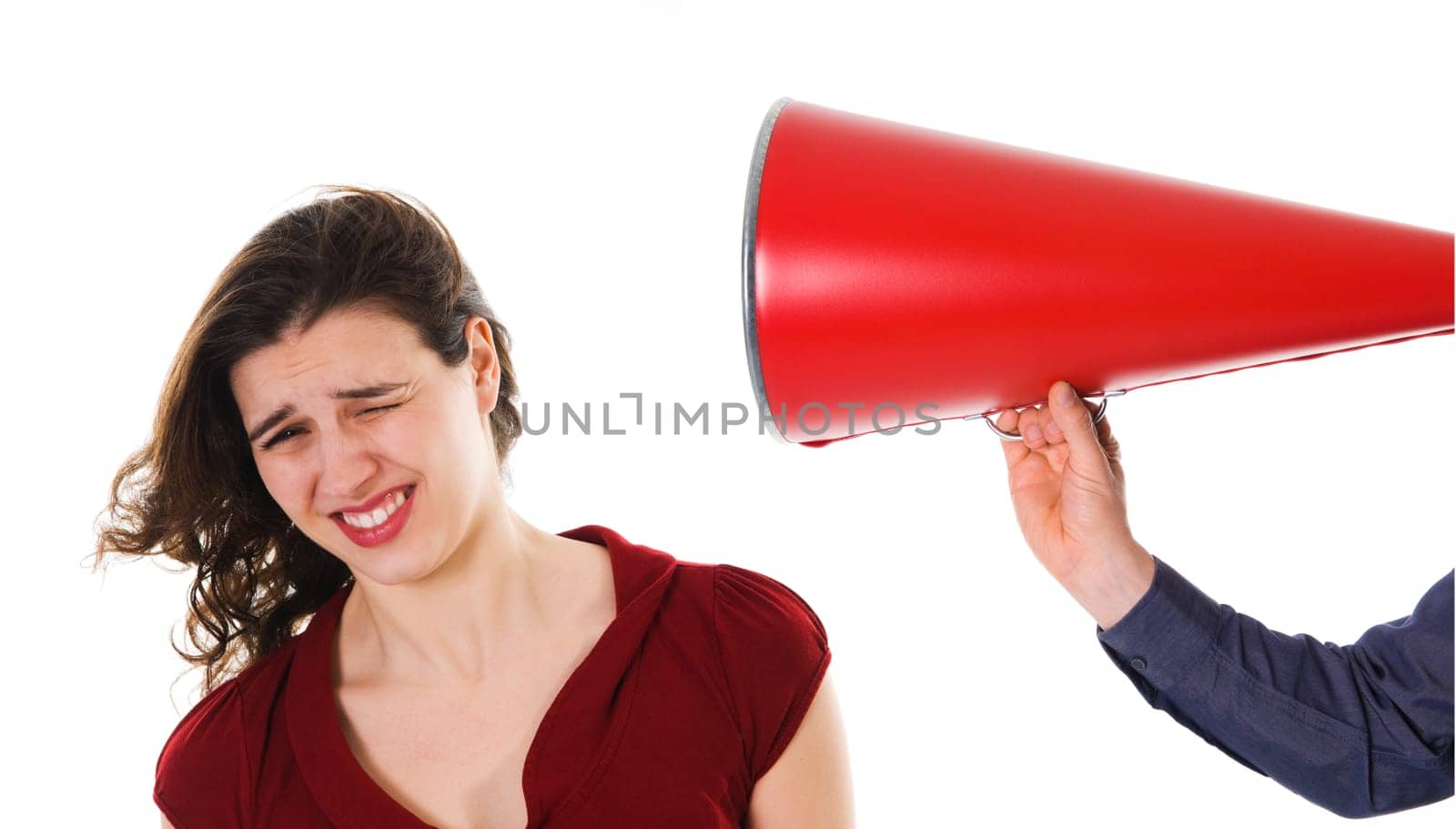 business man with megaphone harrassing colleague