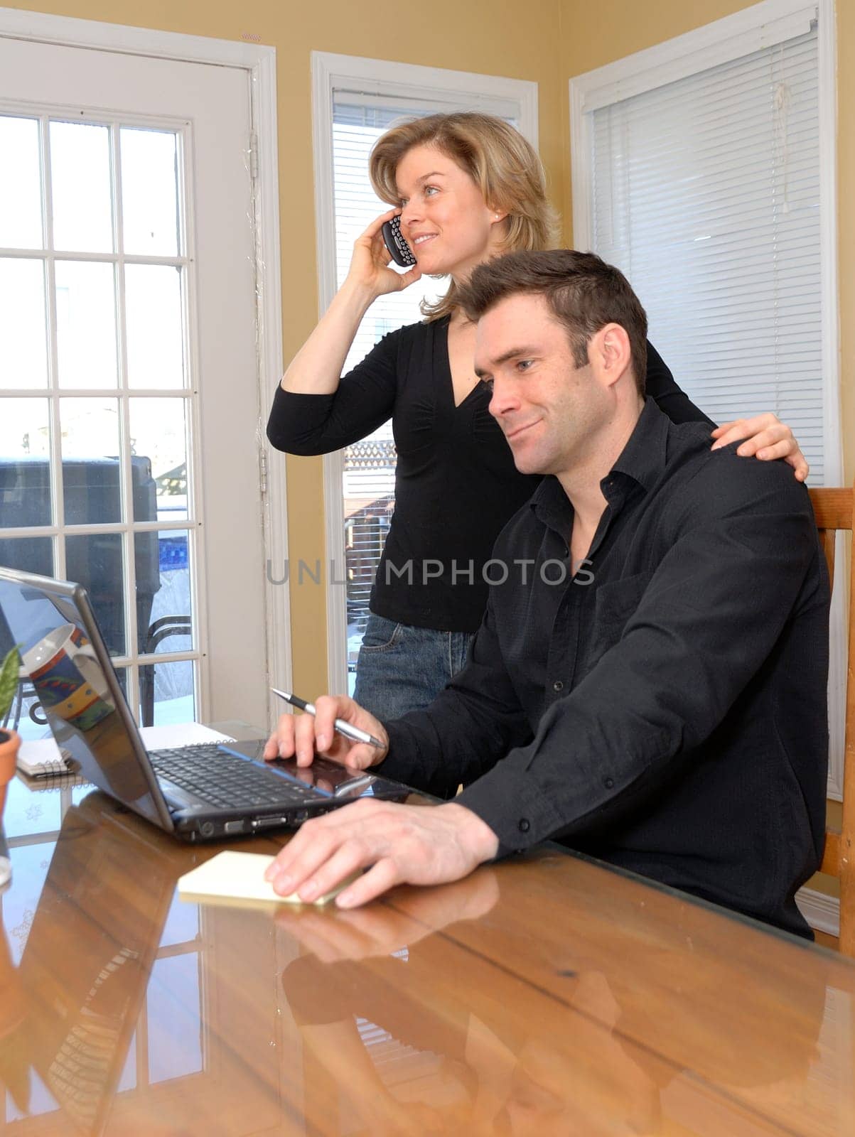 cute couple doing business from home