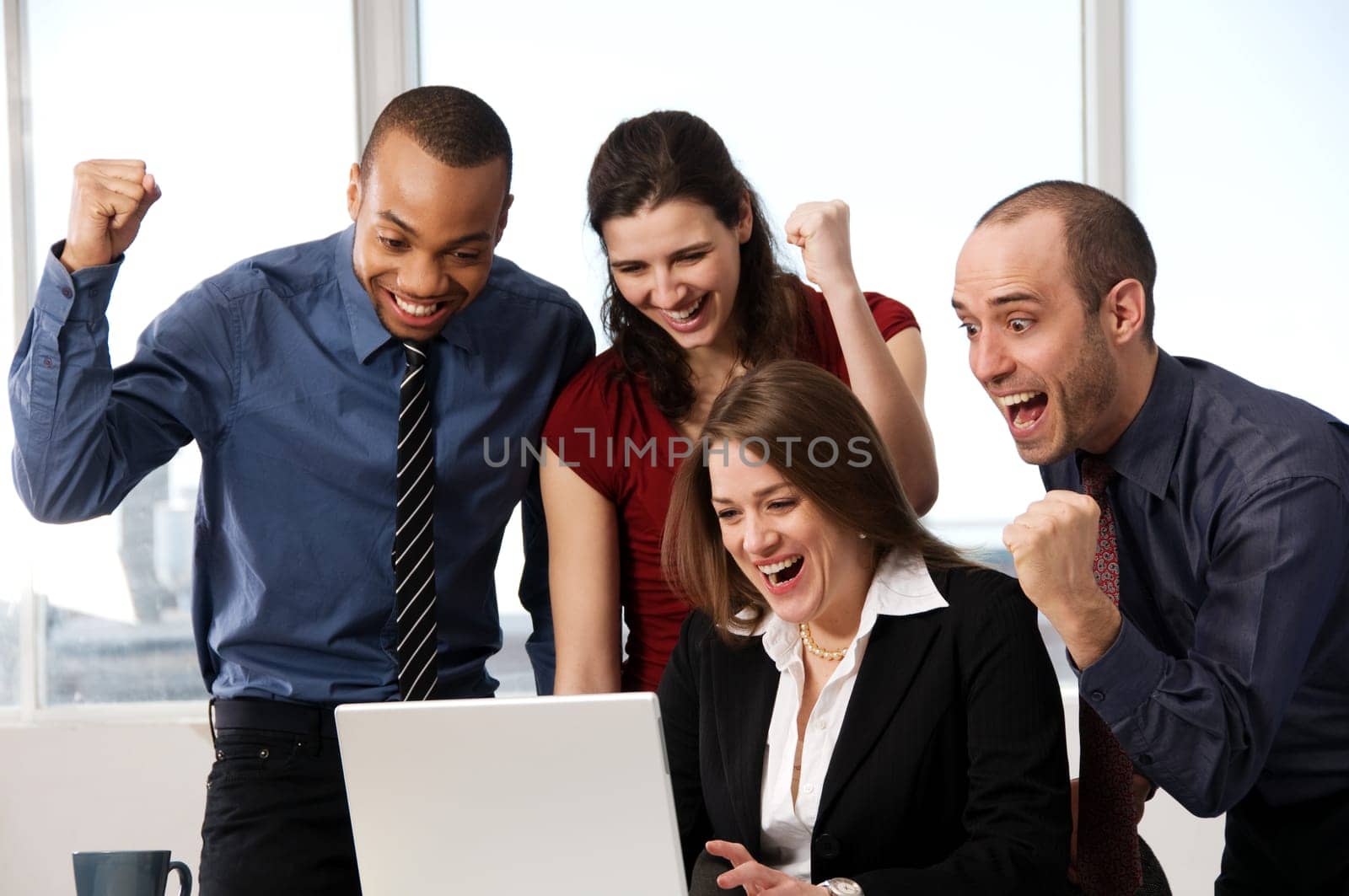group of business people at an office desk