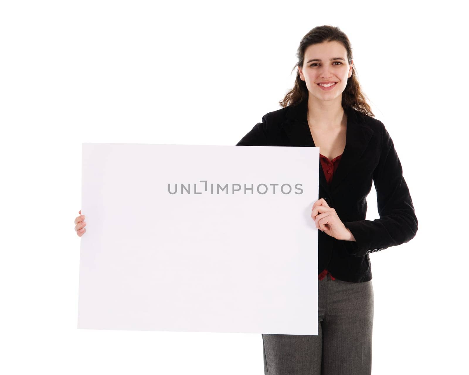 business person holding a white piece of cardboard