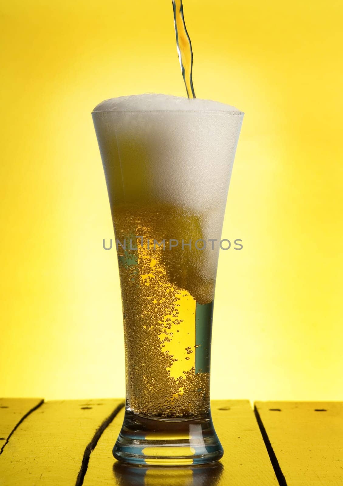 pouring beer in a glass