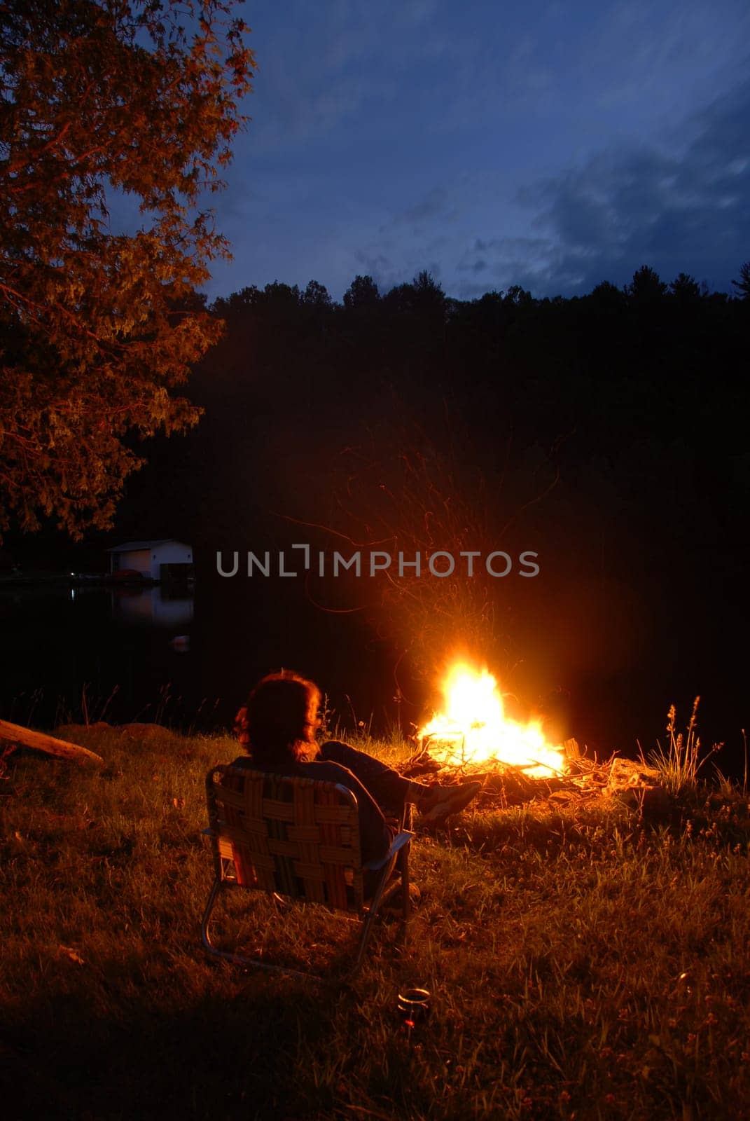 woman looking at fire