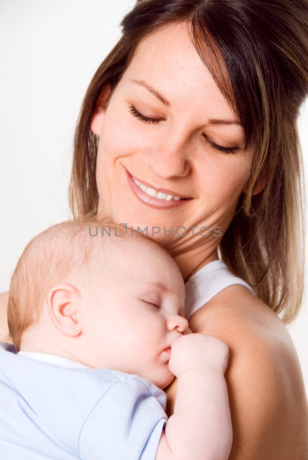 new mom holding her newborn baby boy