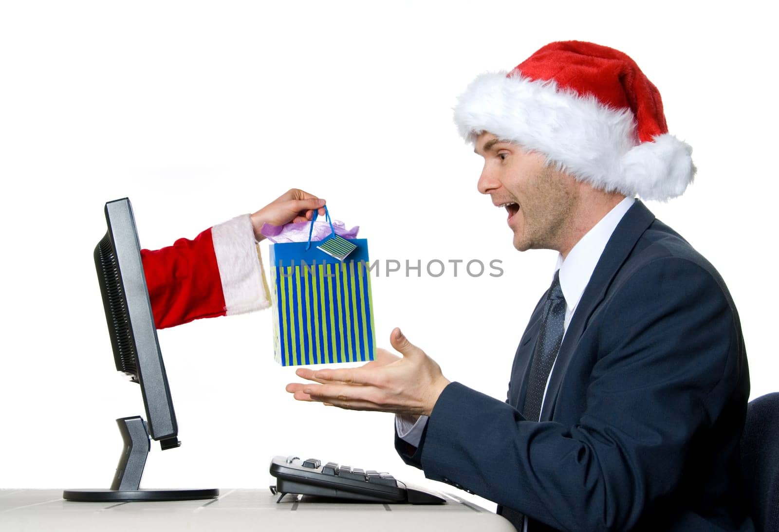 man receiving a x-mas gift by internet via santa