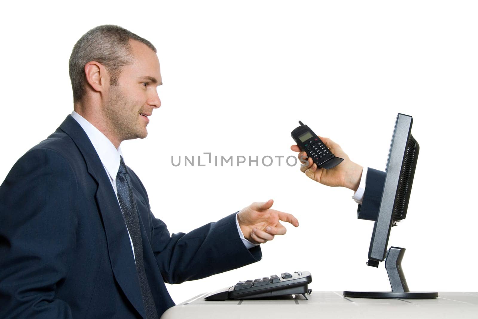 man in blue suit in office taking an internet call