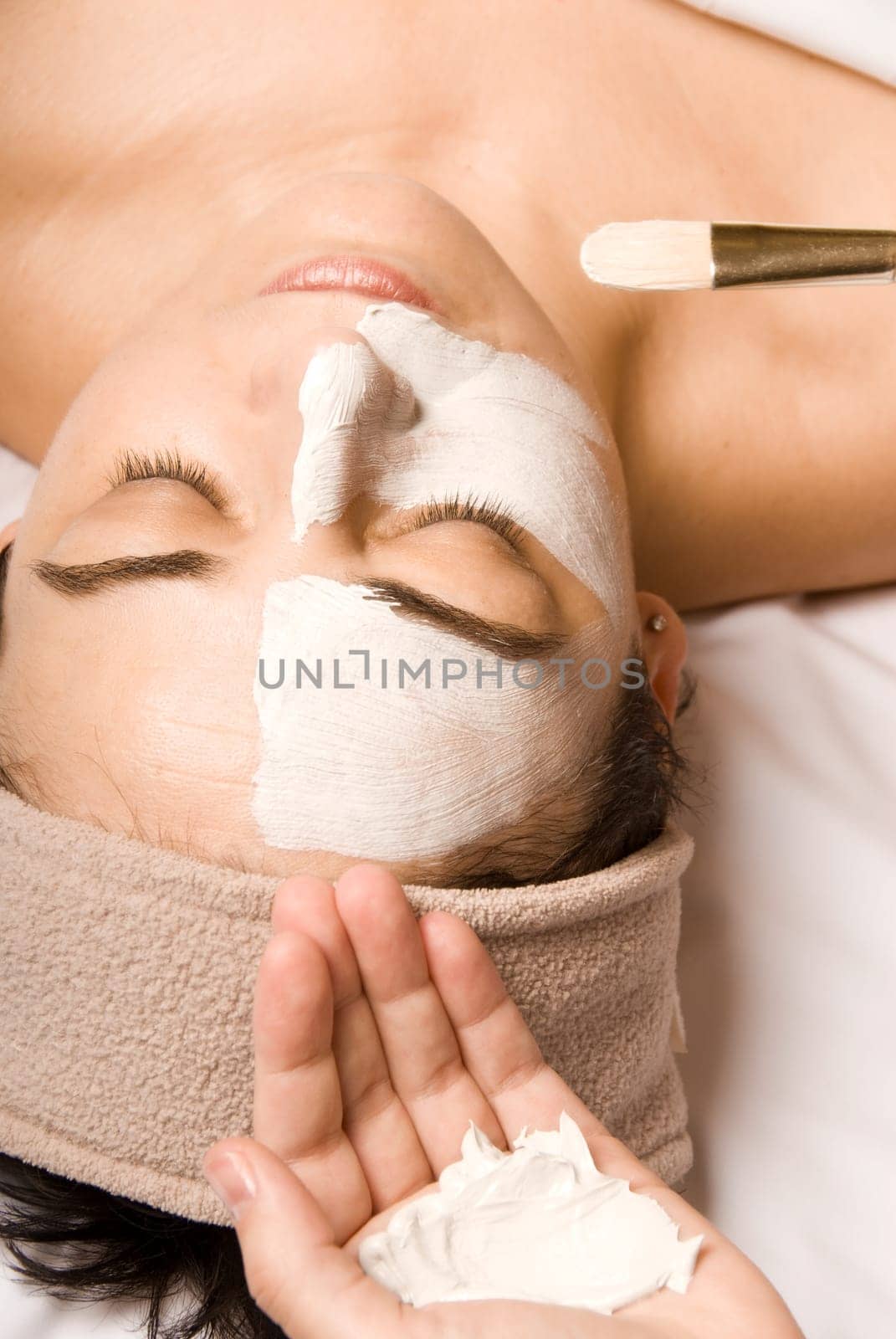 woman relaxing with a nice facial cream