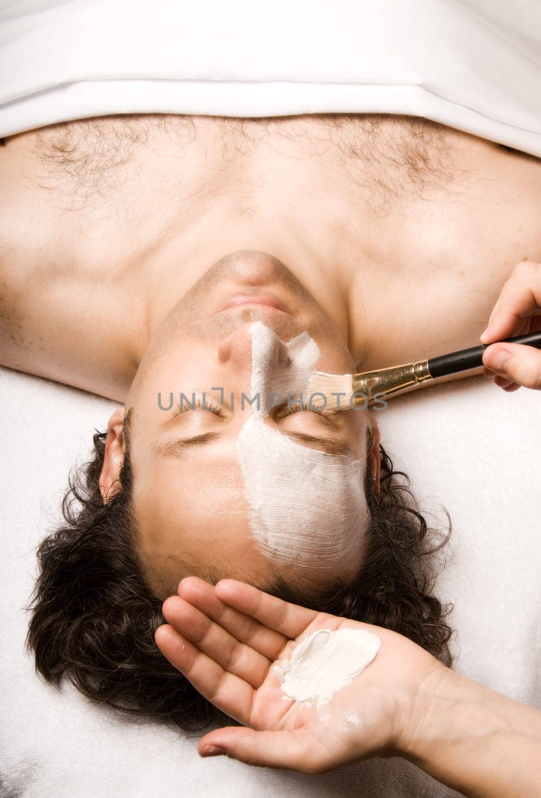 man relaxing with a nice facial lotion