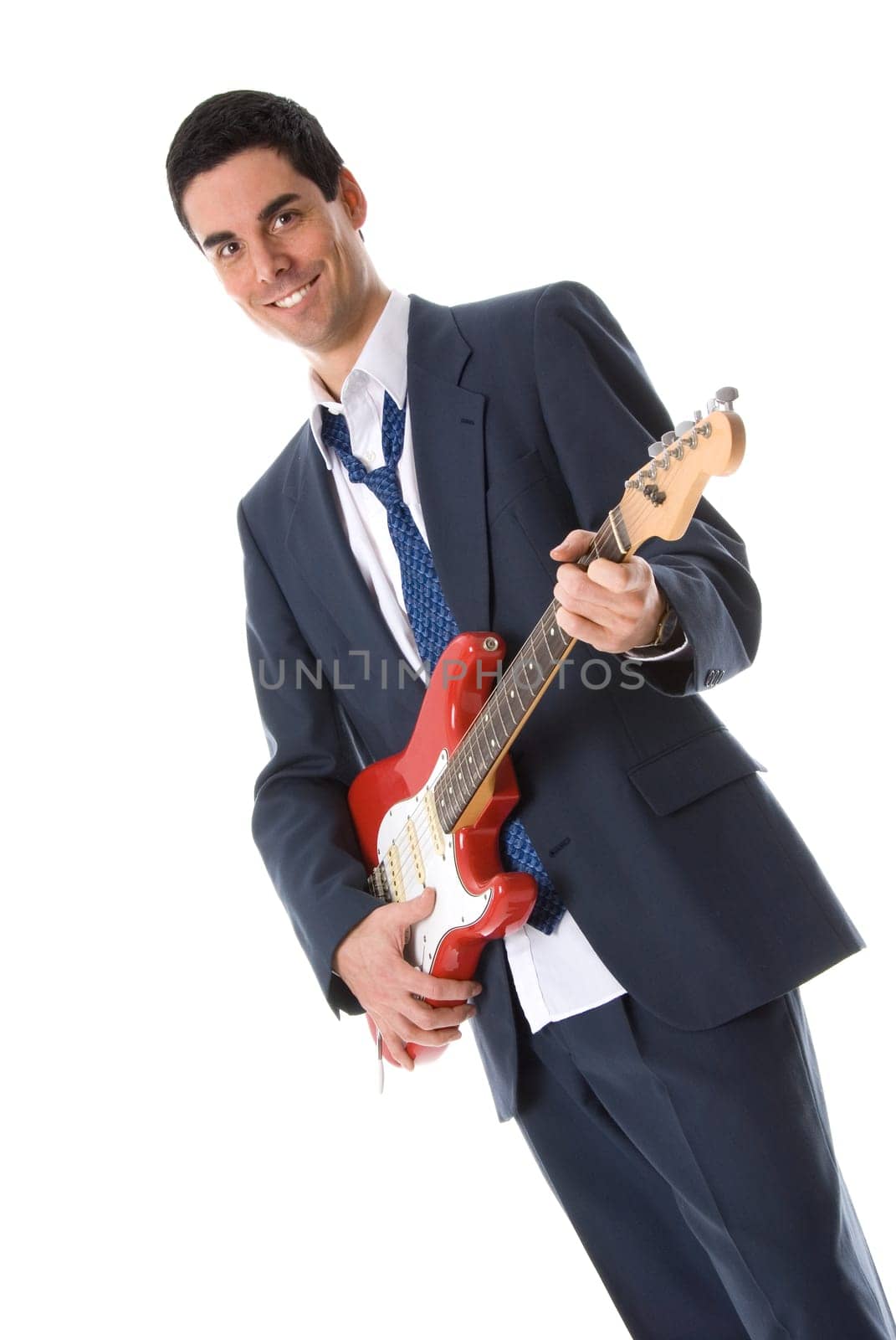 man in business suit with a guitar