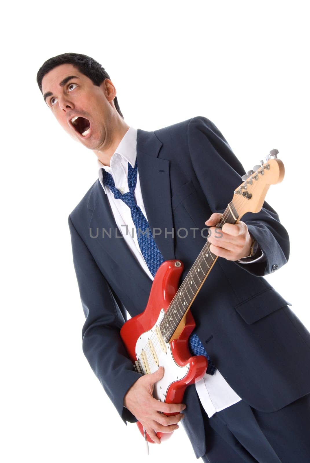 screaming man in blue suit with a guitar