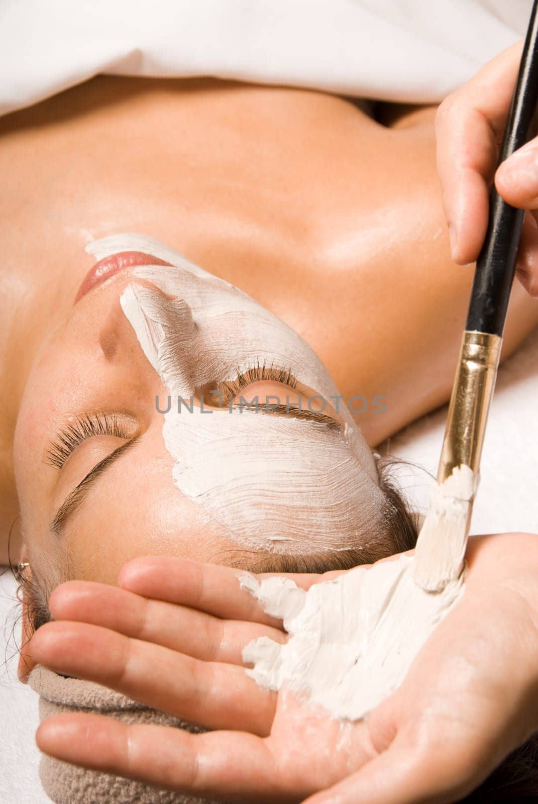 woman relaxing with a nice facial massage