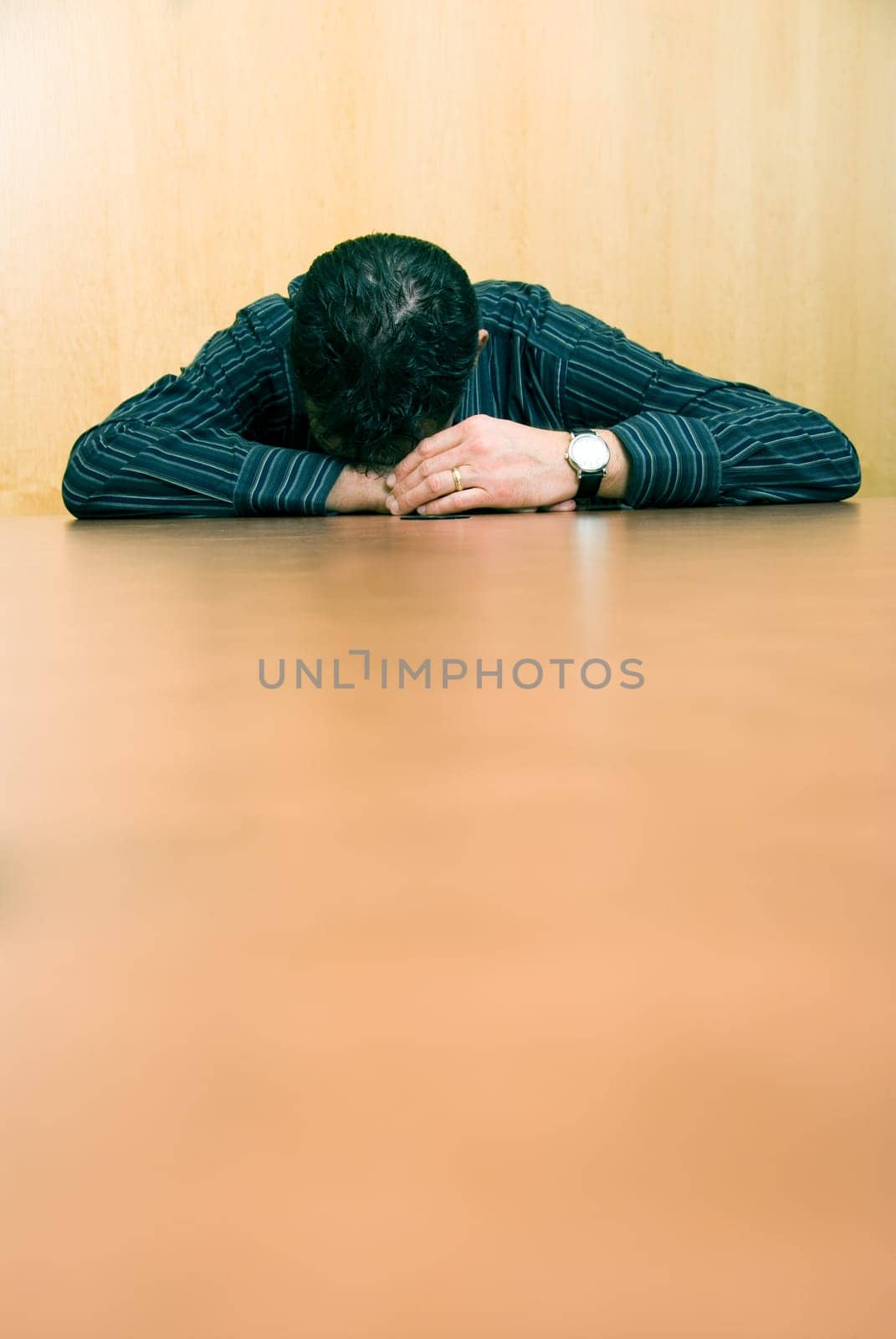 business man sleeping at his desk in the office