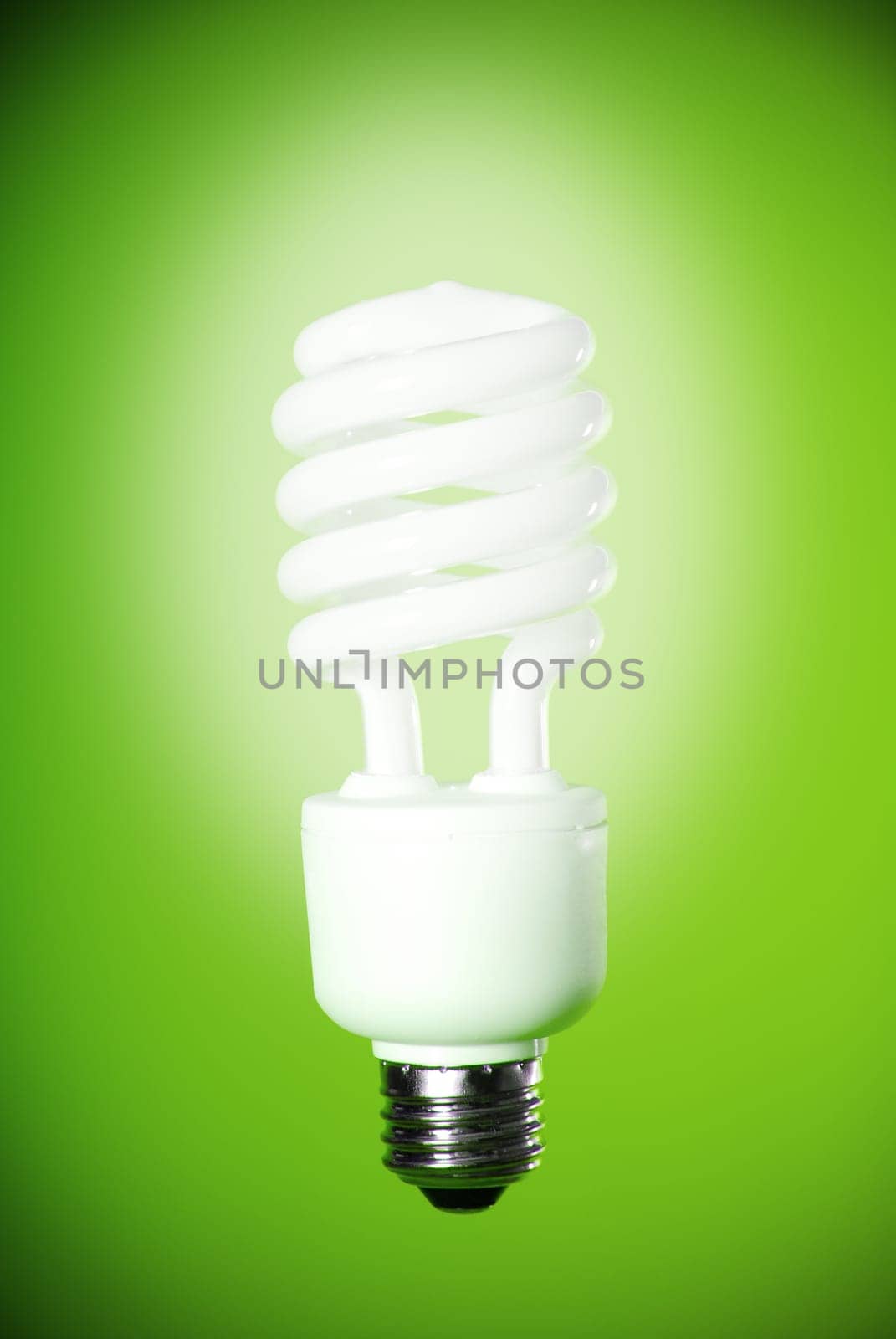 eco light bulb on a green background