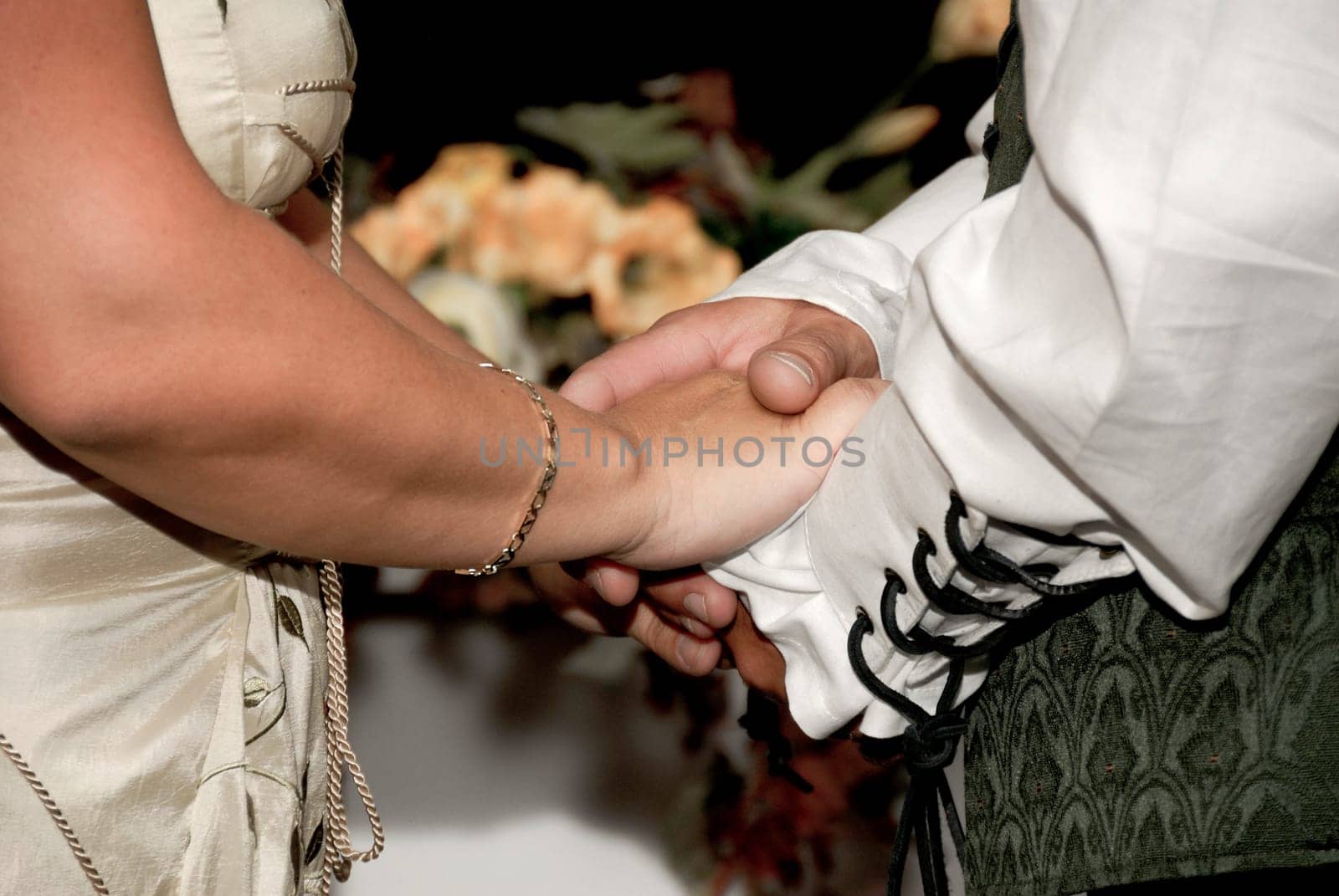 the bride and groom sharing their vows