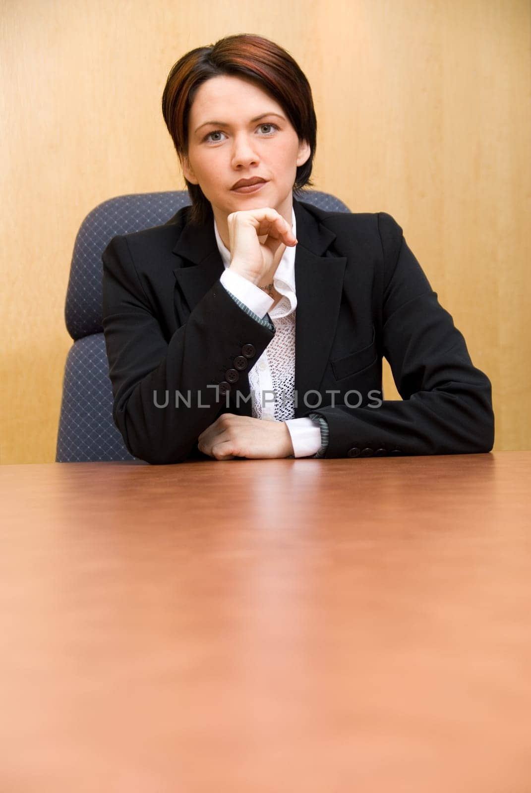 serious business woman in a boardroom table