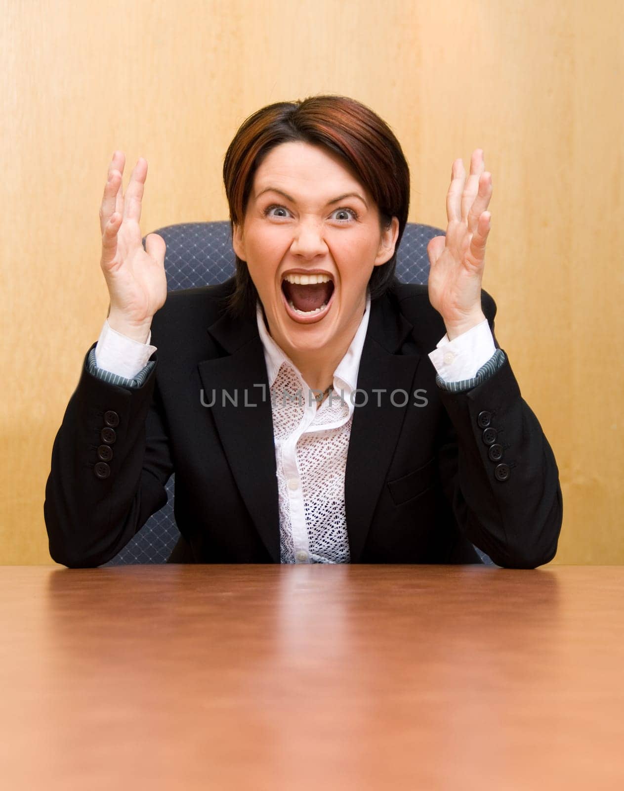 cute woman in the office in panic mode