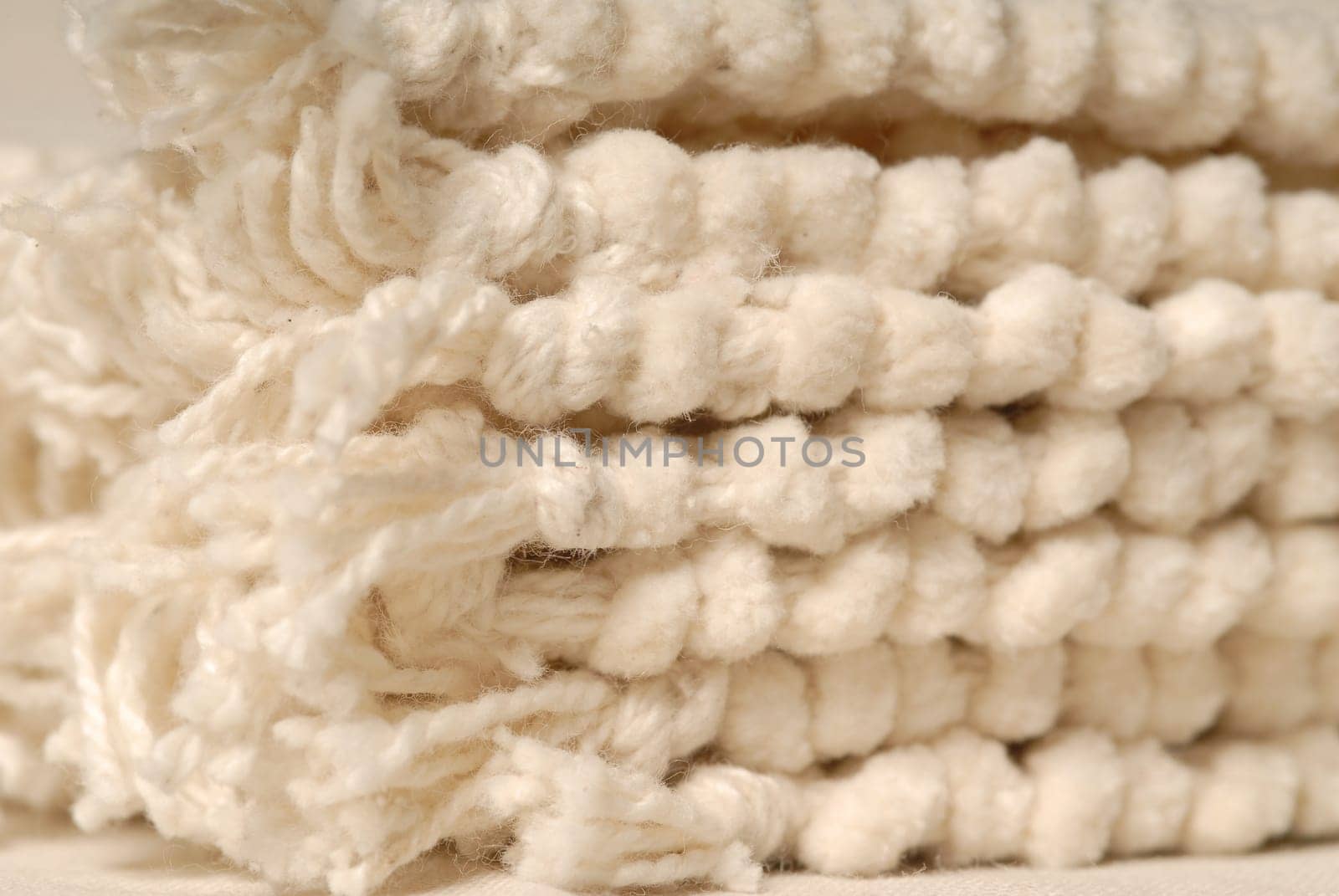 stacked beige towels