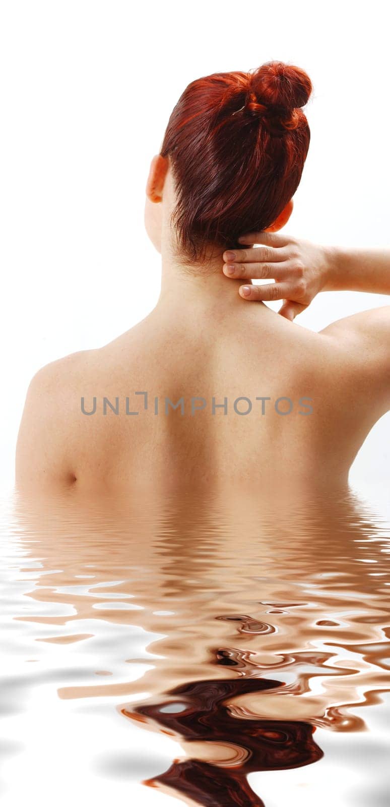 woman from the back showing neck pain