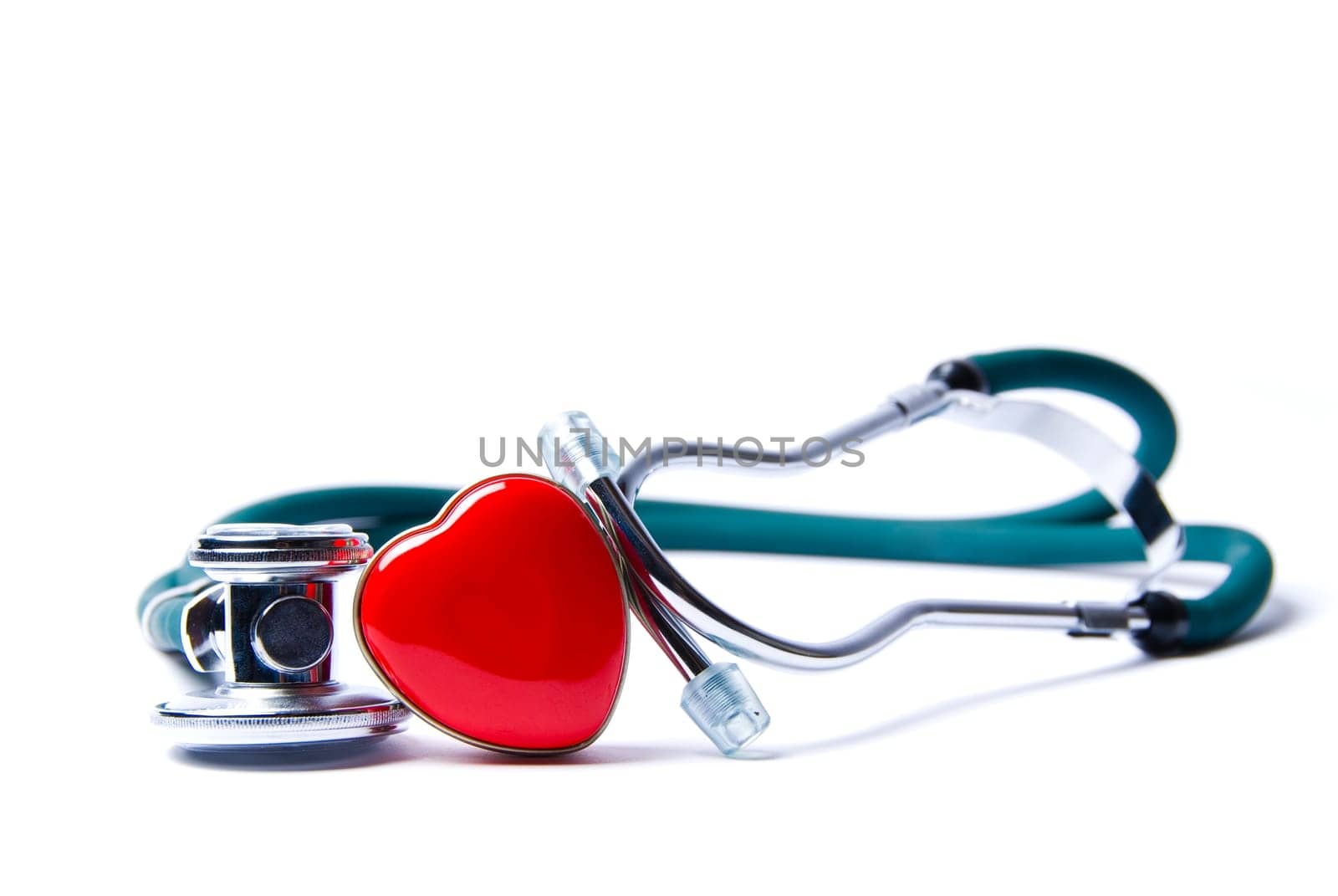 Stethoscope in green on an isolated white background