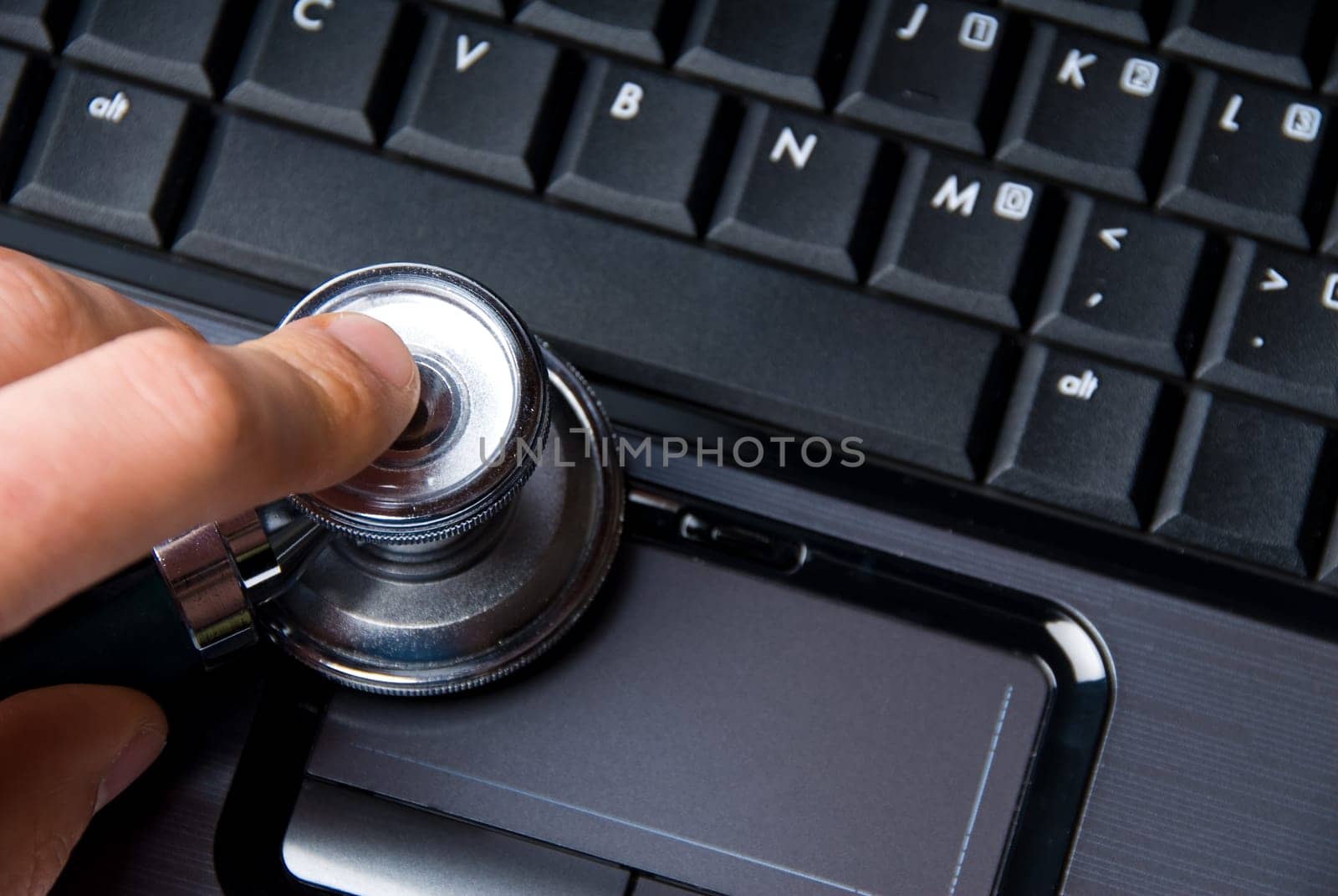 Stethoscope and laptop isolated on white backgound