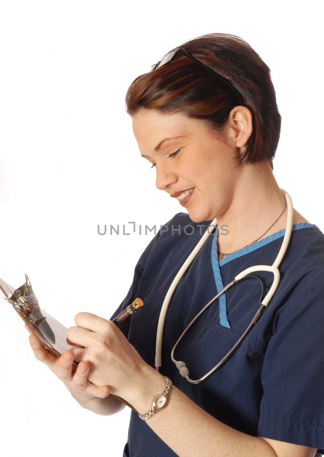 nurse writing on pad