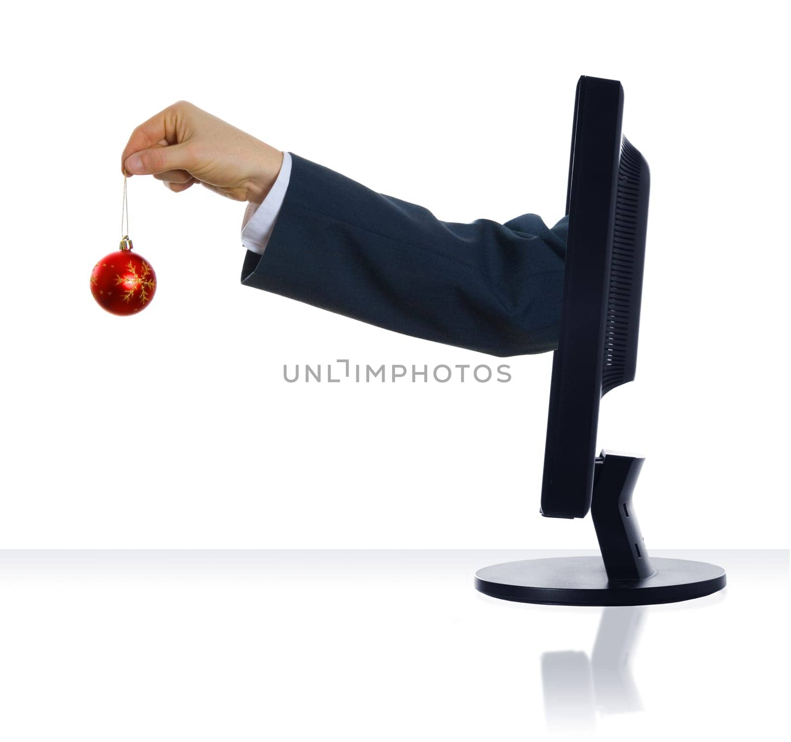A hand sticking out holding an ornament