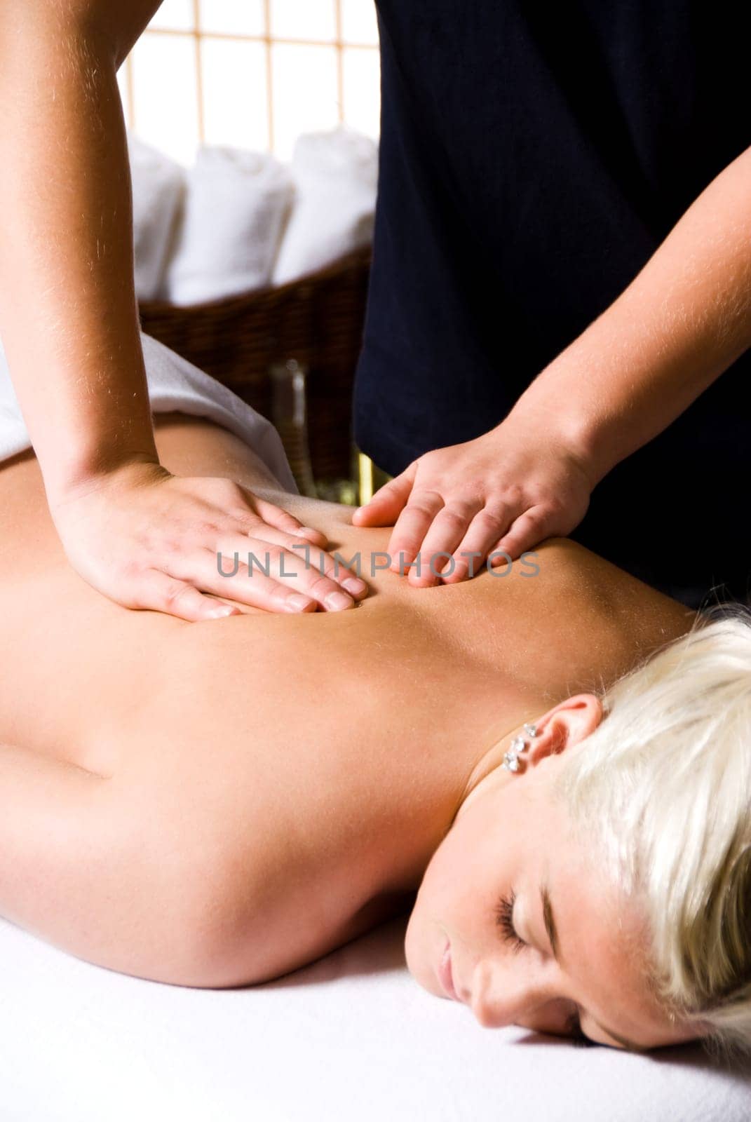 woman getting a good massage at a day spa