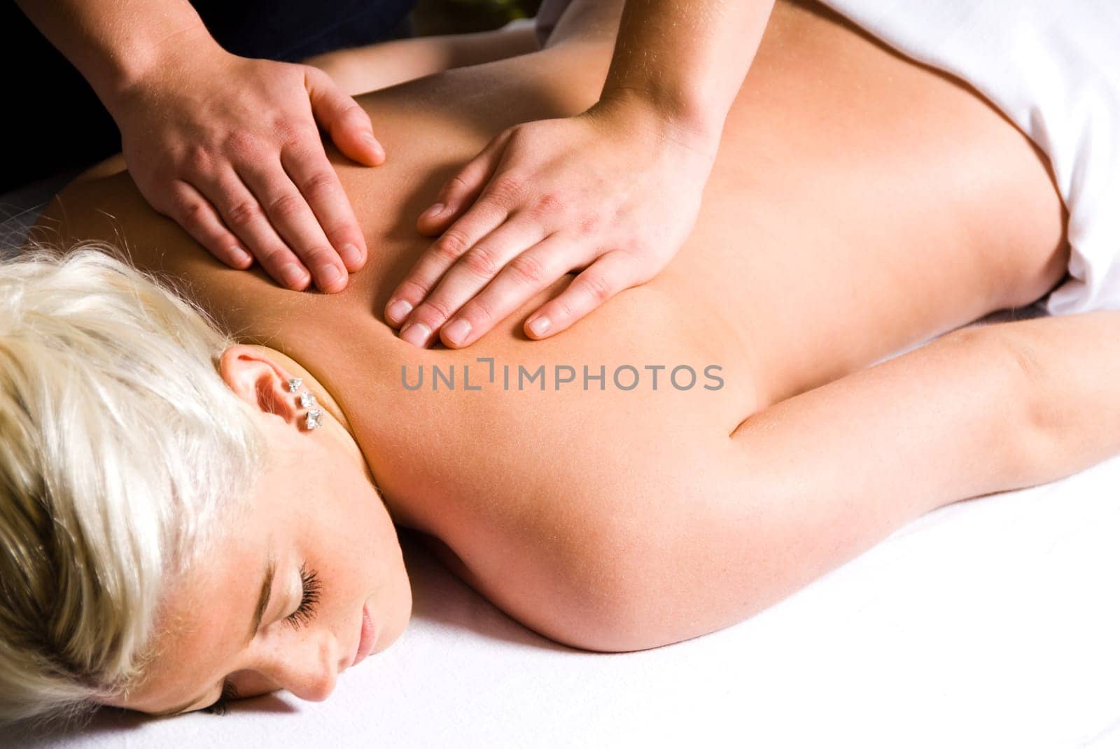 woman getting a good massage at a day spa