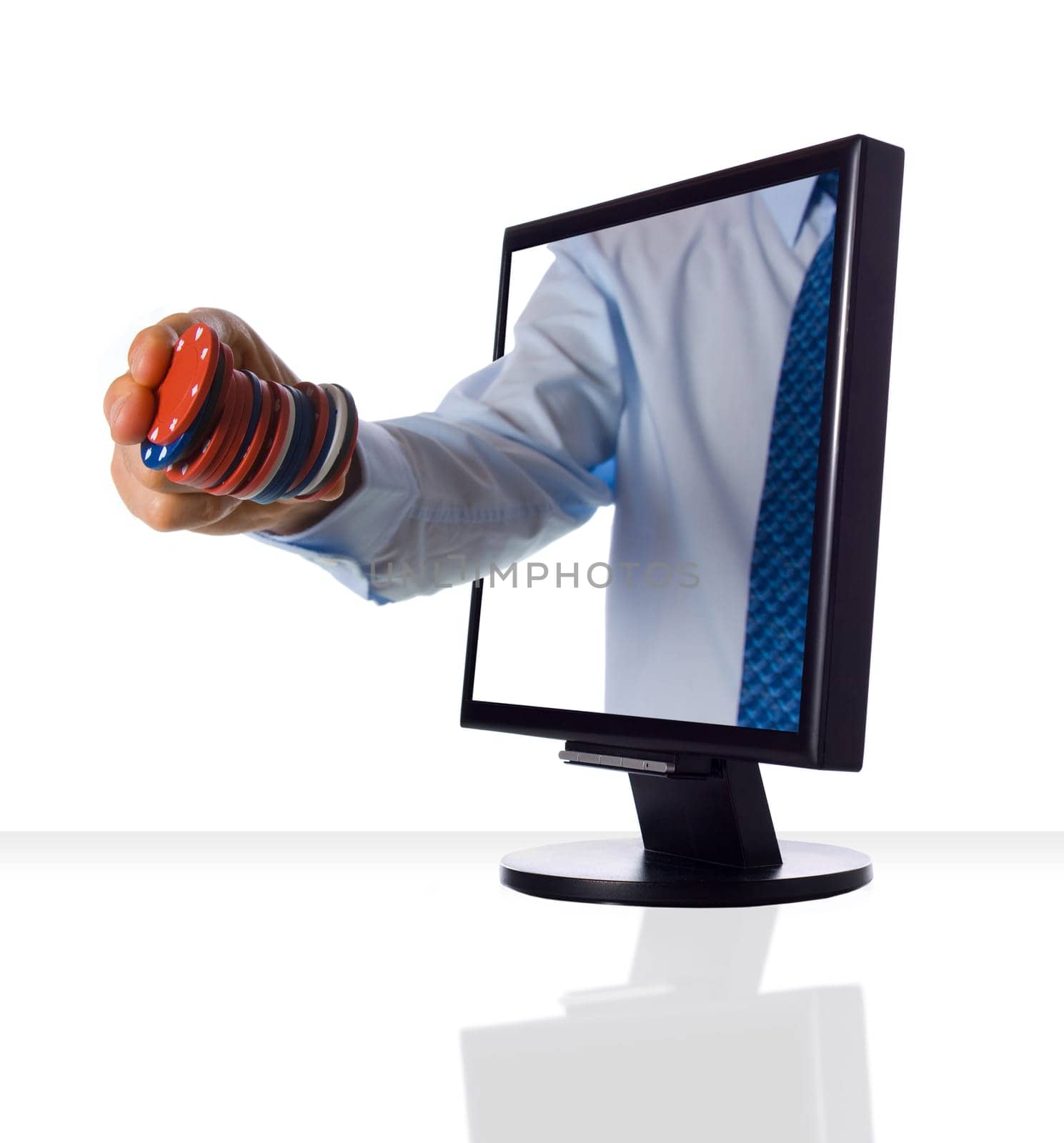 A hand holding some casino chips from monitor