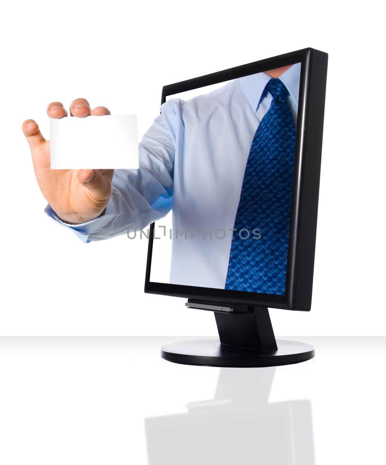 A hand giving a business card through a monitor