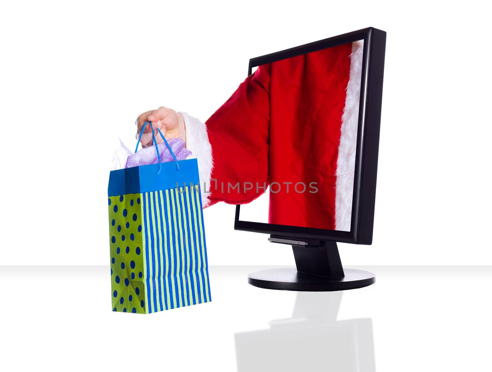 internet xmas shopping with santa clause in red