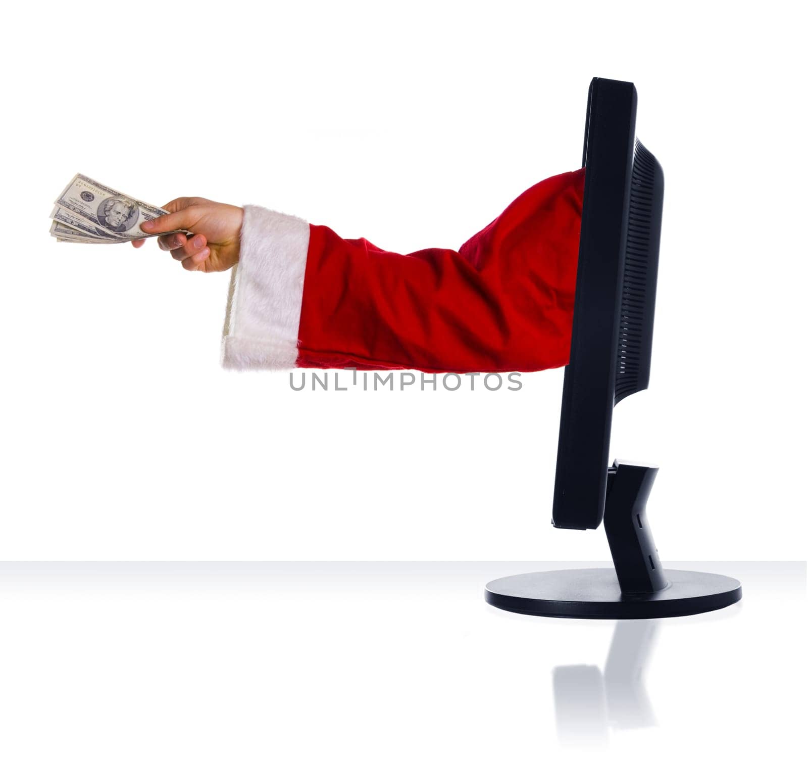 money holding from santa clause in a monitor