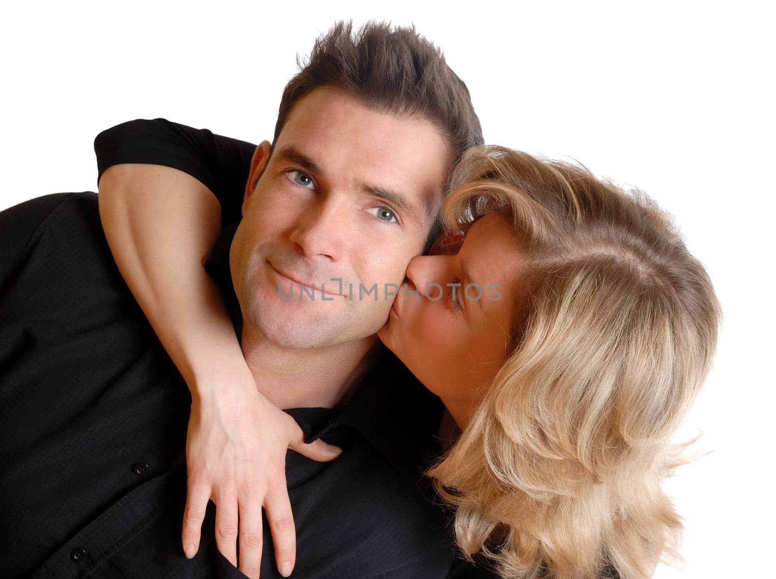woman kissing her cute man on the cheek
