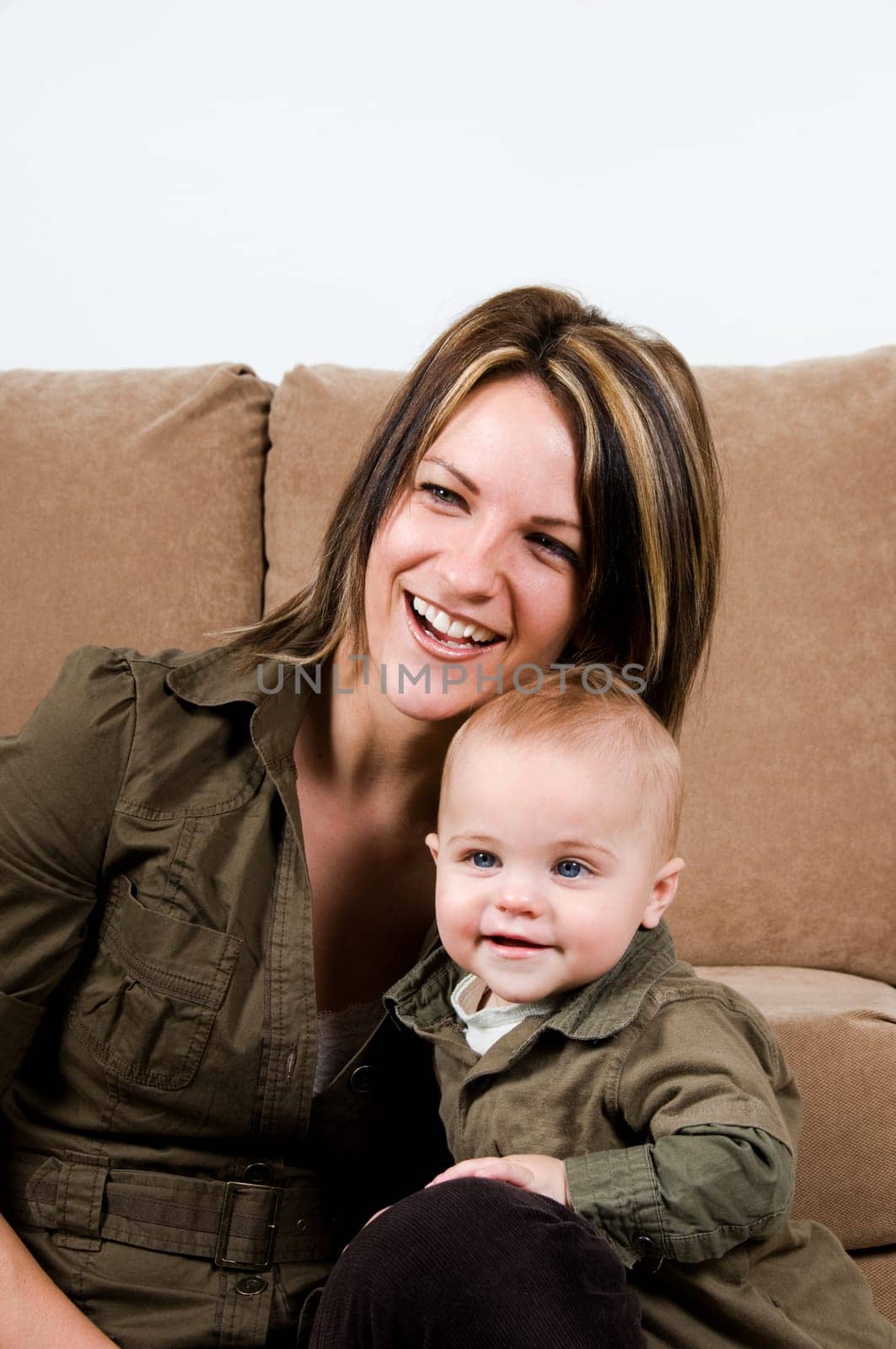 mom happy with their baby boy blue eyes