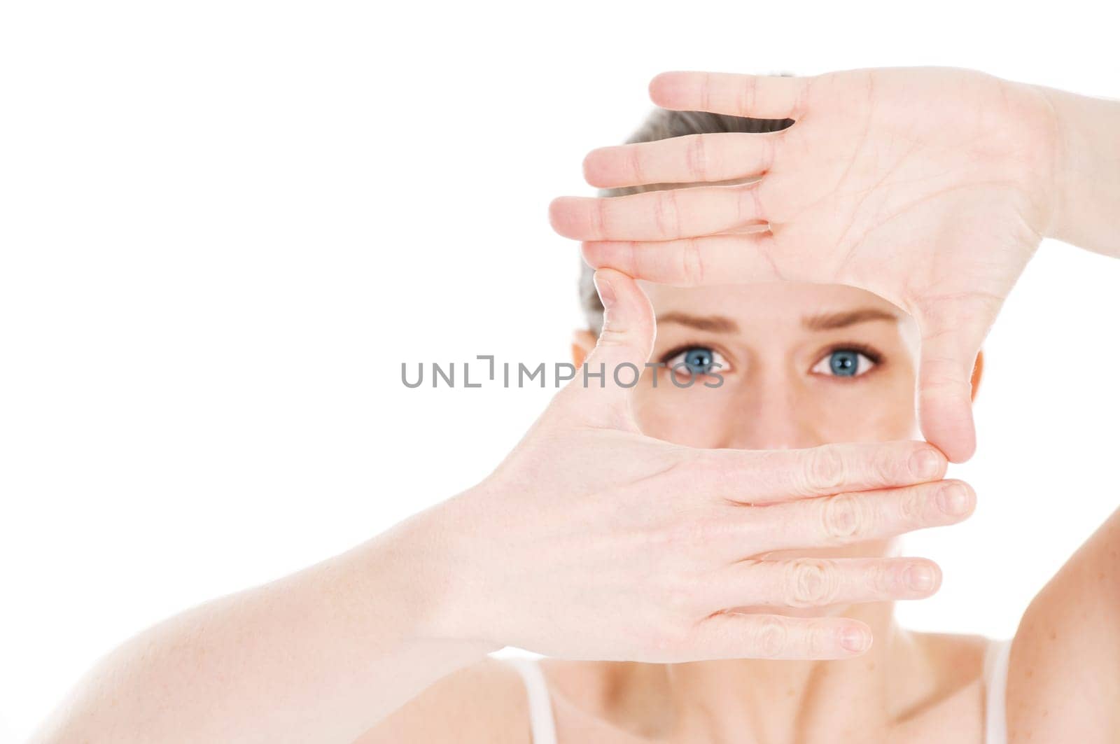 blond young woman with blue eyes on white