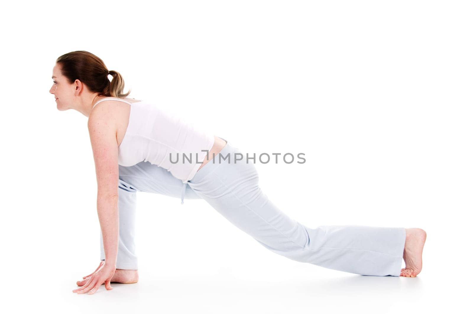 Beautiful woman doing yoga on isolated white background