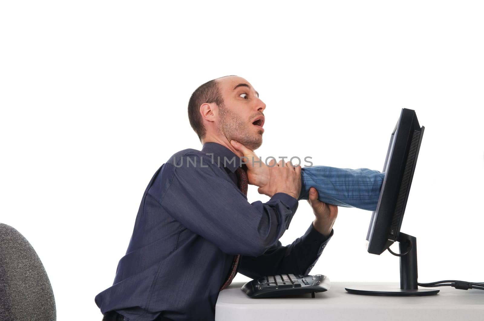 business man getting stragled by the computer