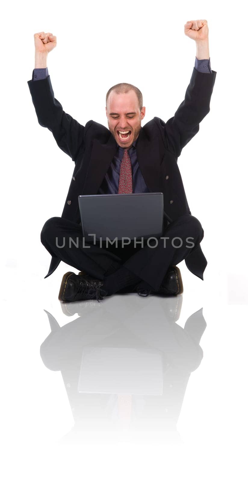 happy business man on a laptop on white
