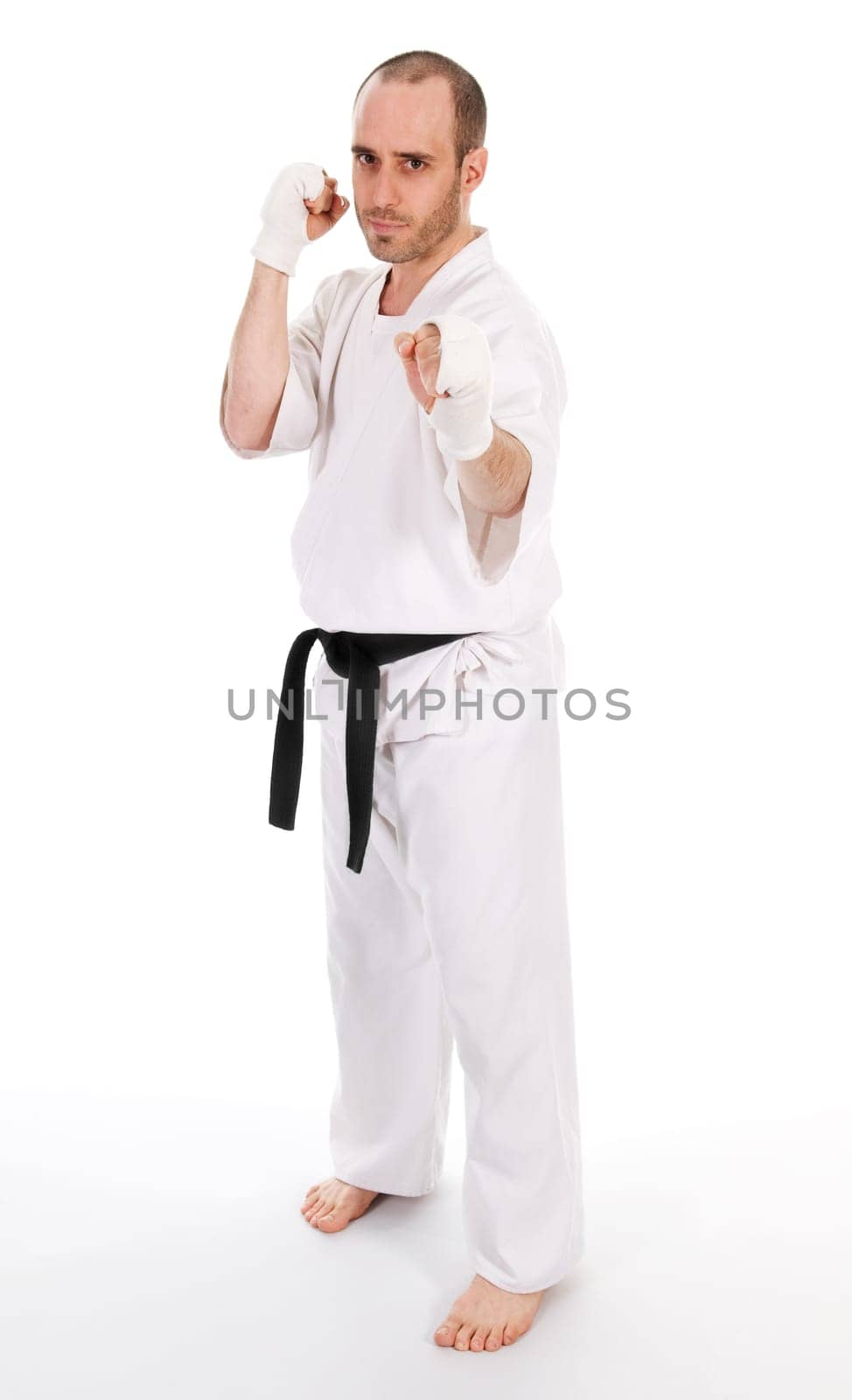 White man doing martial arts on isolated background
