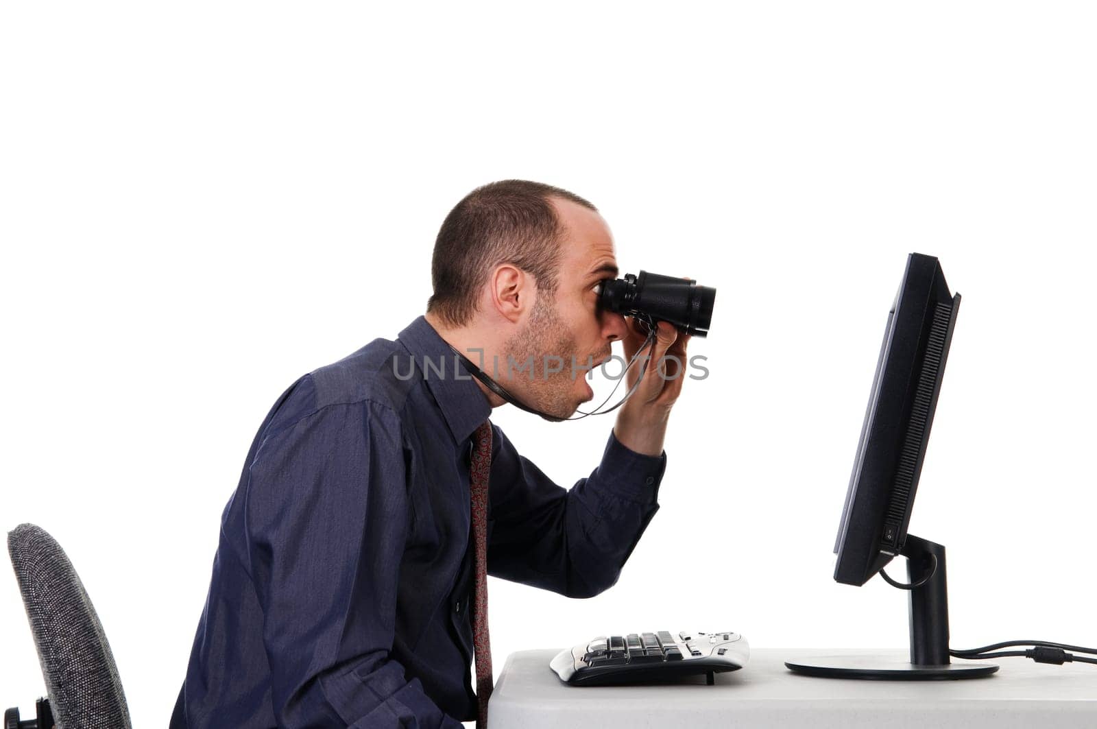 business man looking at a computer monitor