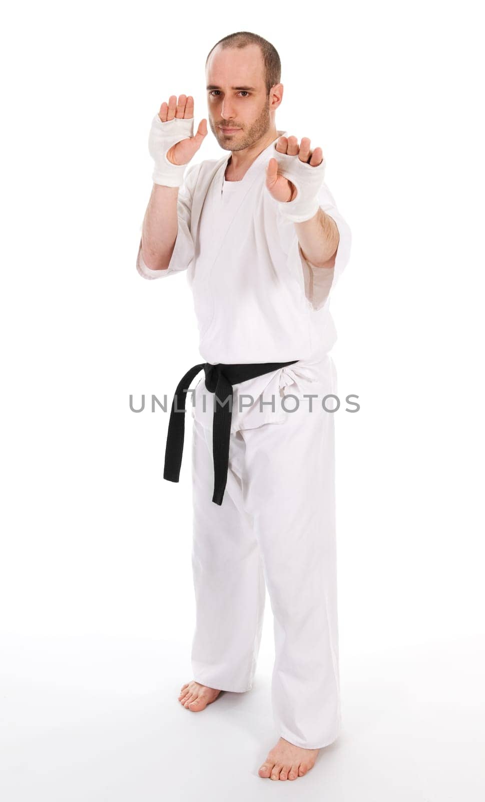 White man doing martial arts on isolated background