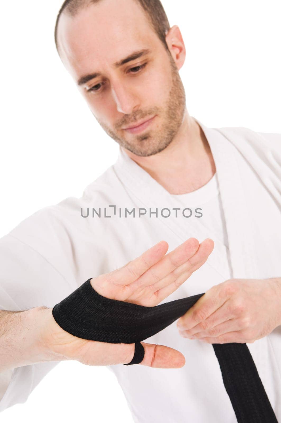 White man doing martial arts on isolated background