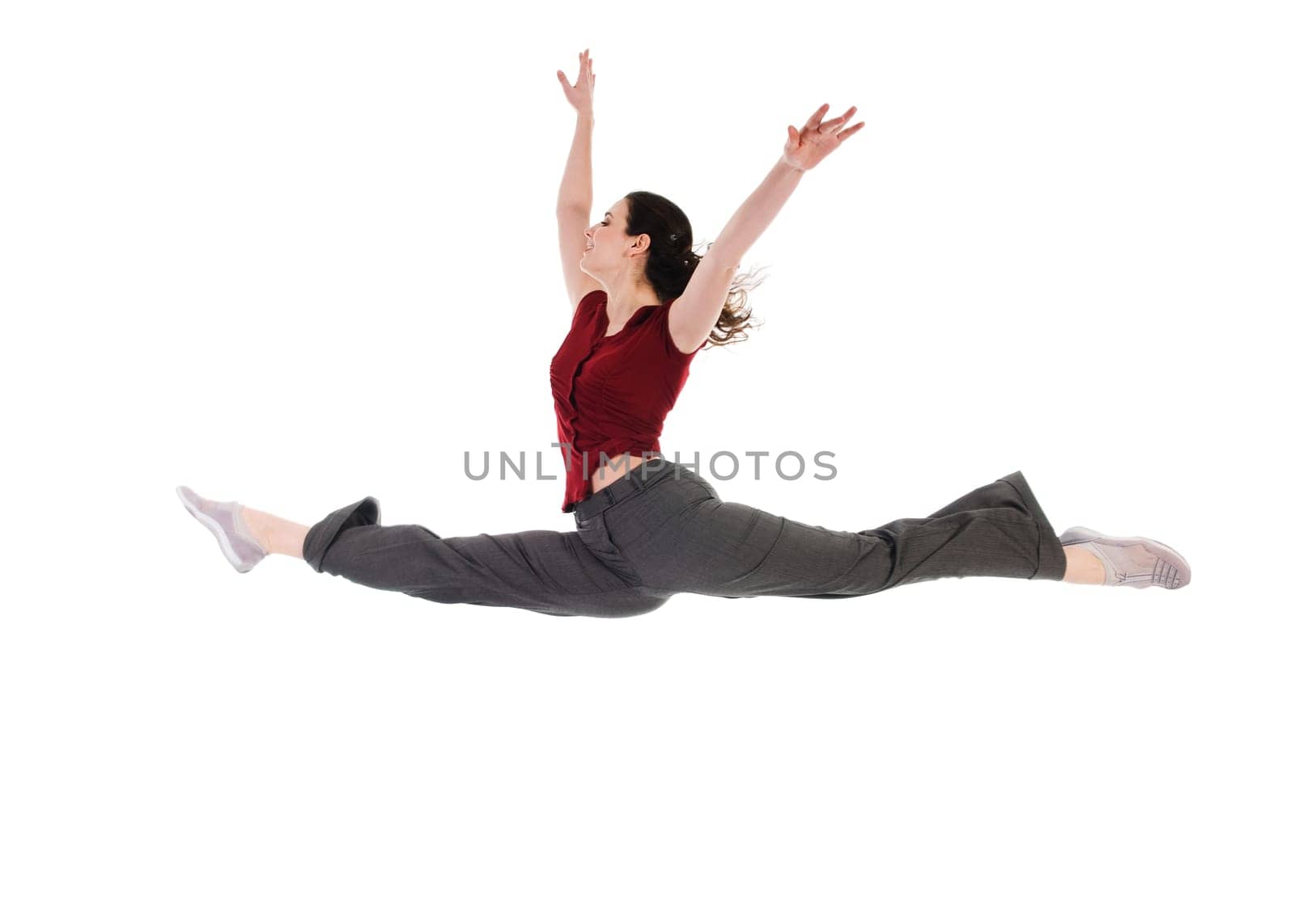 young attractive female dancer doing the splits