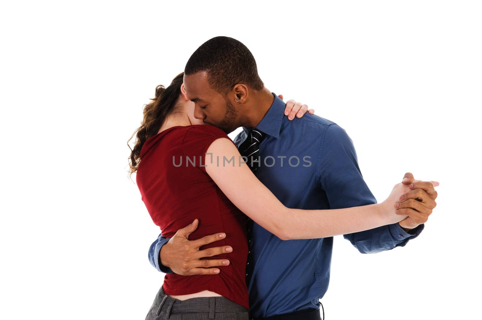 young multi ethnic couple beautiful dancing on white