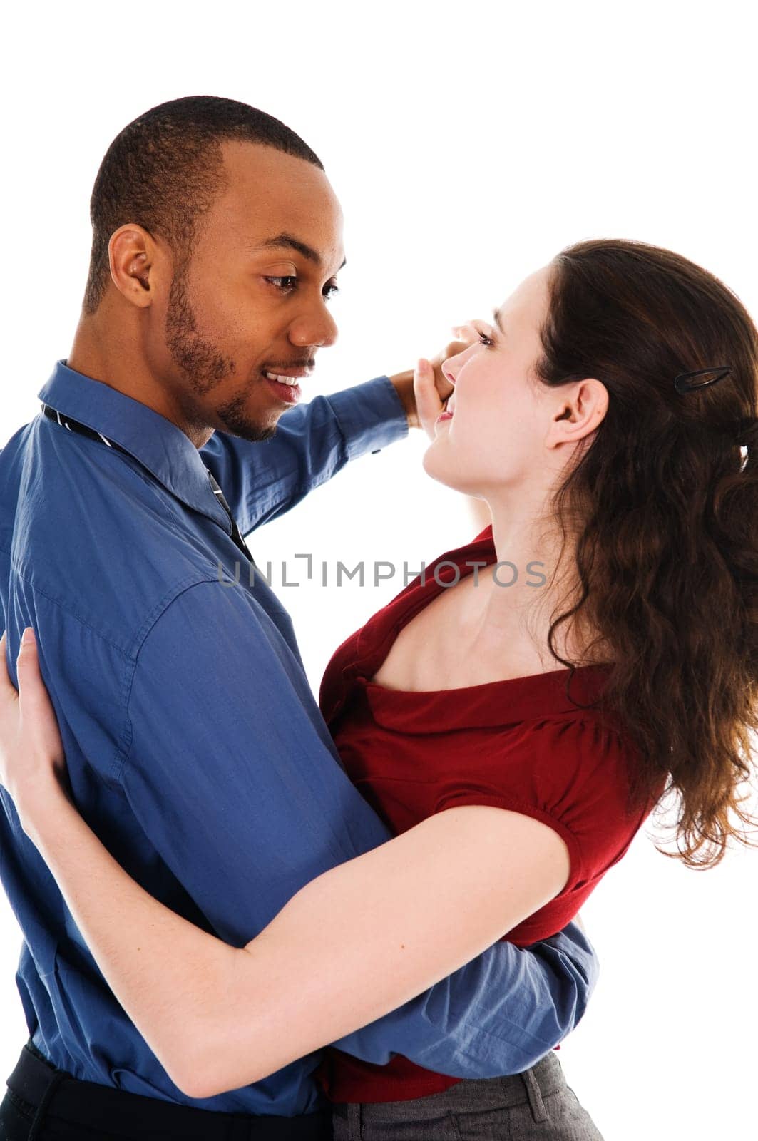 young multi ethnic couple beautiful dancing on white