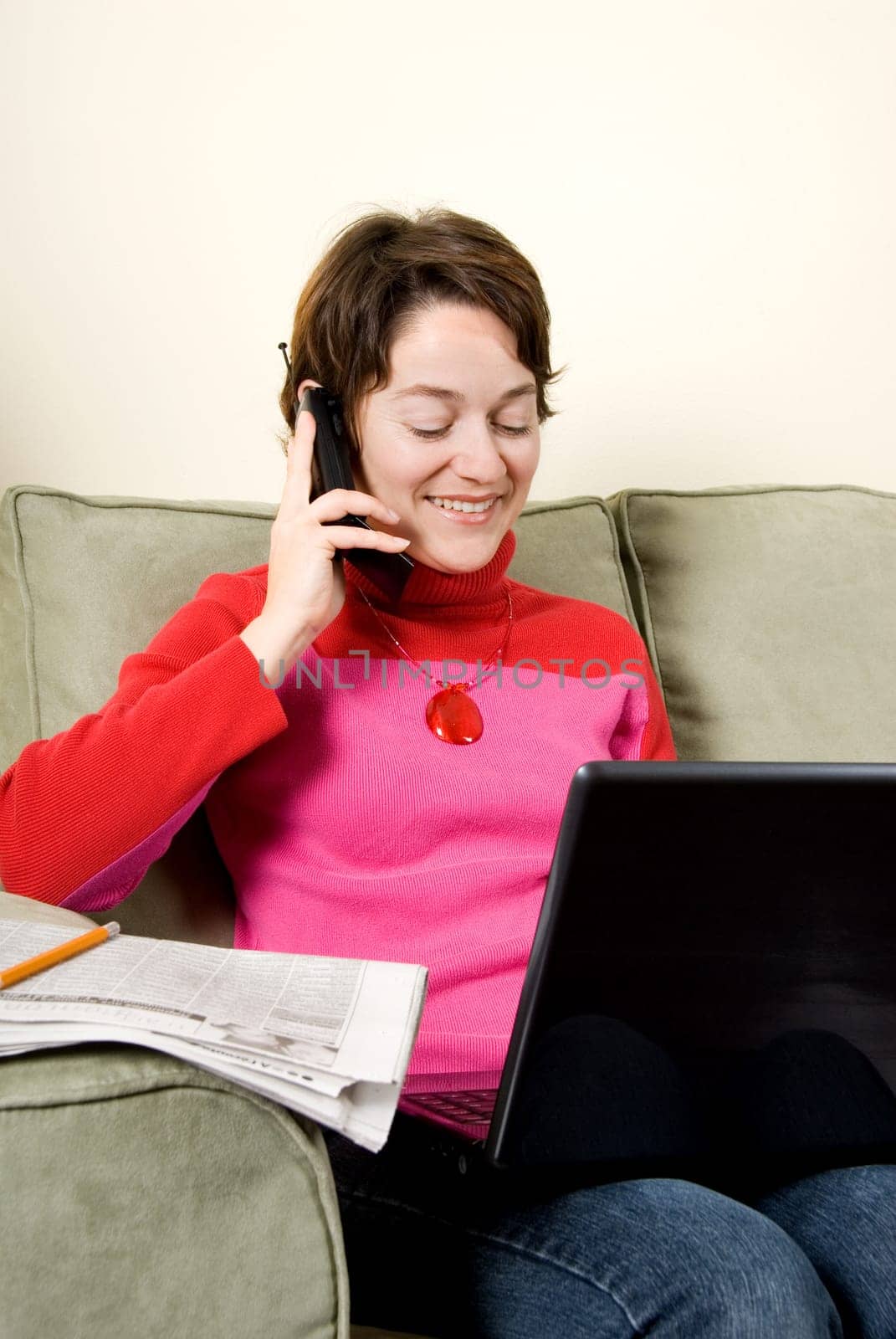 woman surfking the internet while on the phone