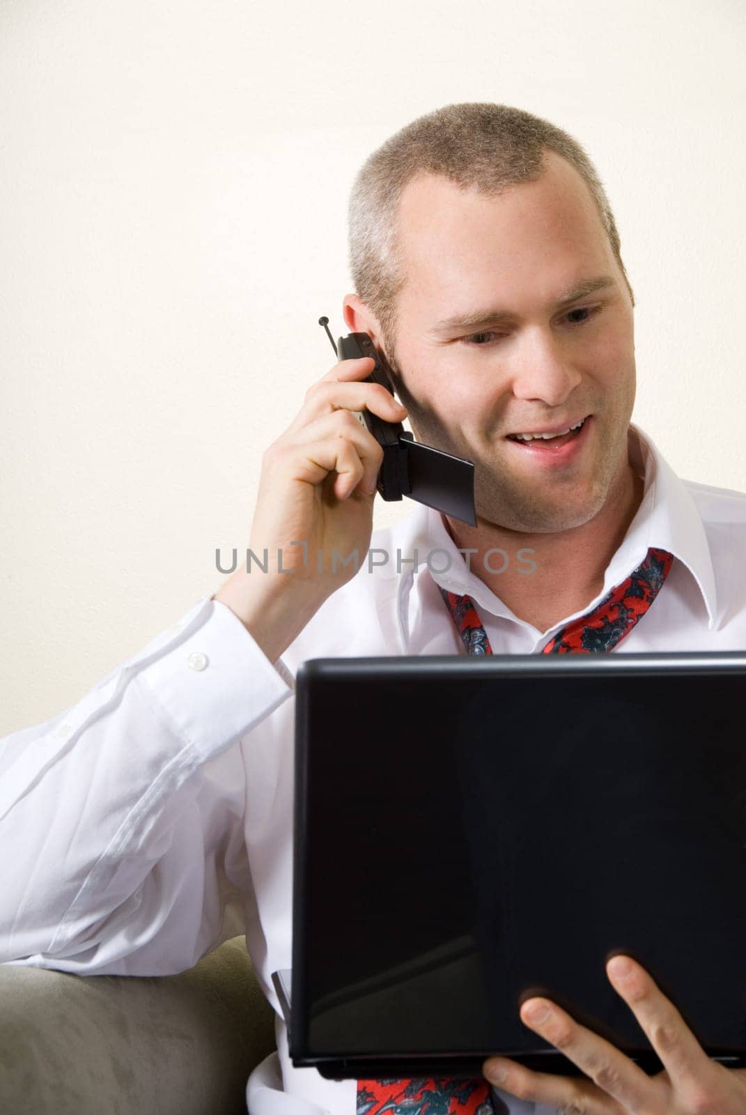 man on the phone talking very happy